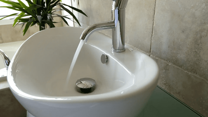 Bathroom sinks ideas - white vessel sink and modern faucet tap