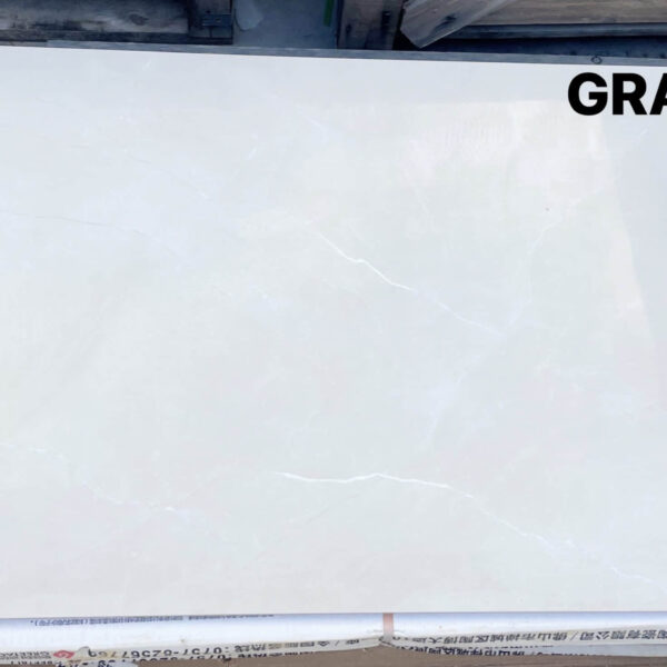 White tile with subtle veining, labeled GRA12601.
