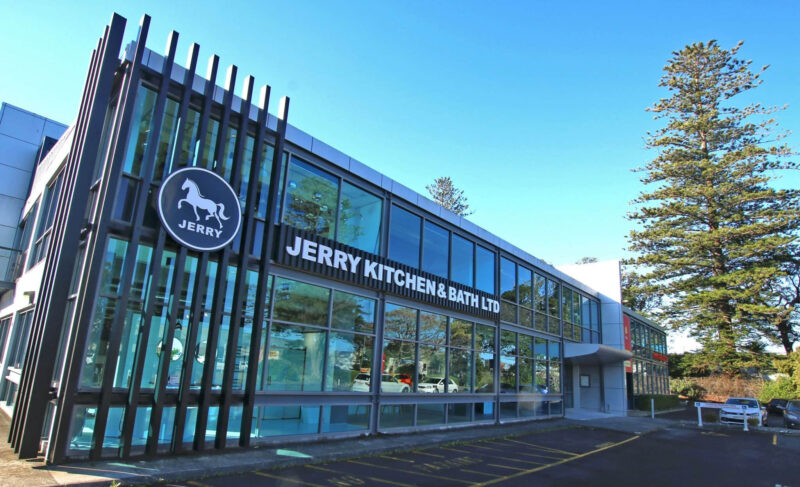 Exterior of Jerry Kitchen & Bath Ltd building with glass facade.