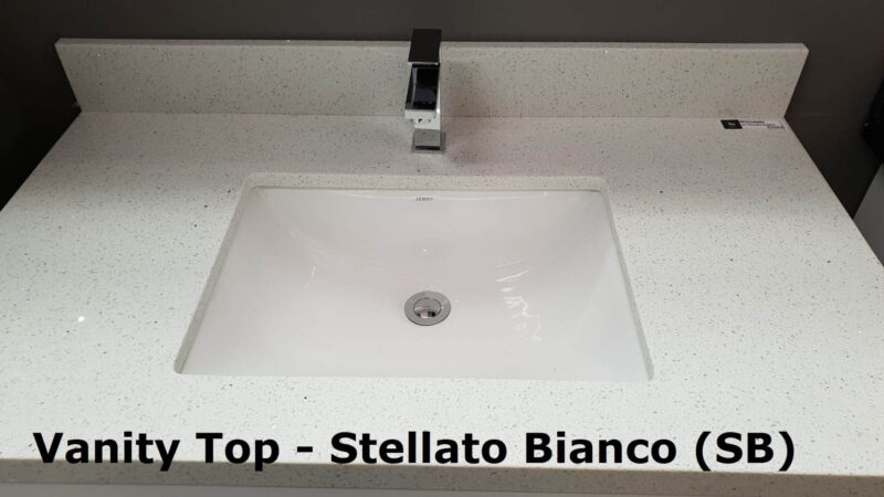 Vanity top with Stellato Bianco finish and modern faucet.