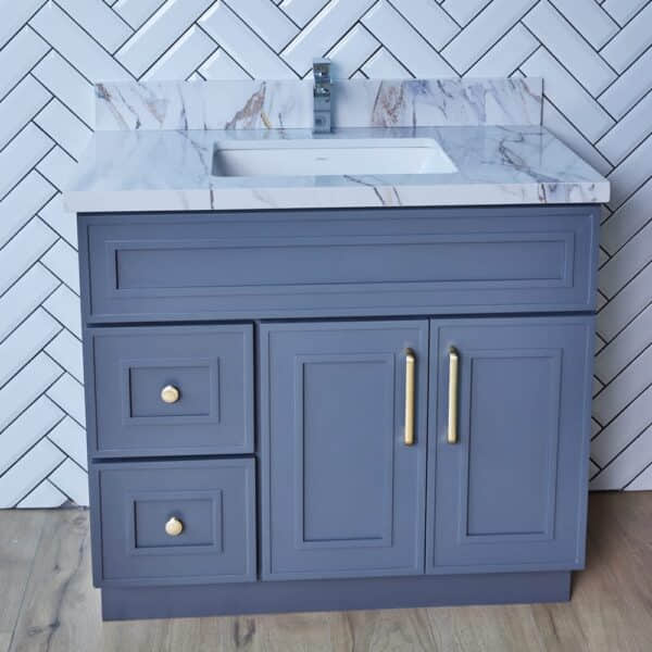 ESDG-V3620DL-1.jpg Blue bathroom vanity with marble countertop and gold handles.