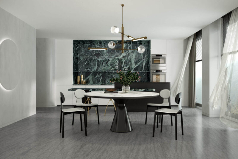 Emerald green kitchen with sintered stone bench and modern decor.