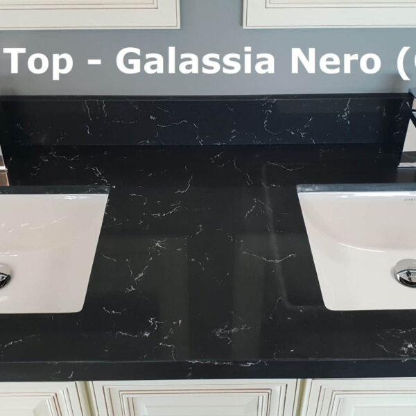 Black vanity top with two sinks, labeled "Galassia Nero (GN)."