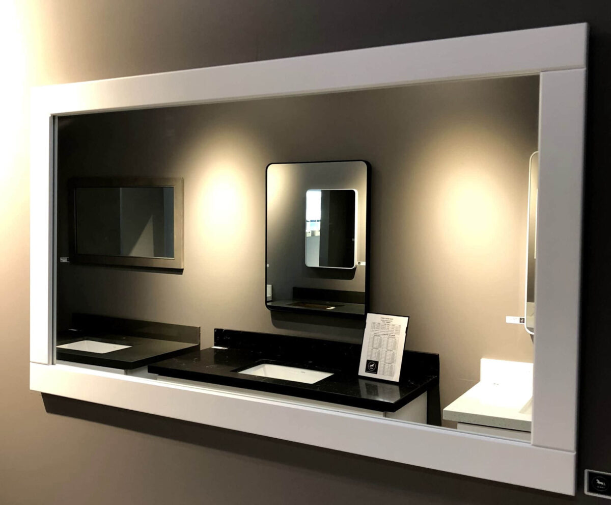 WS-2136.jpg Modern bathroom mirror with integrated lighting and sleek design.
