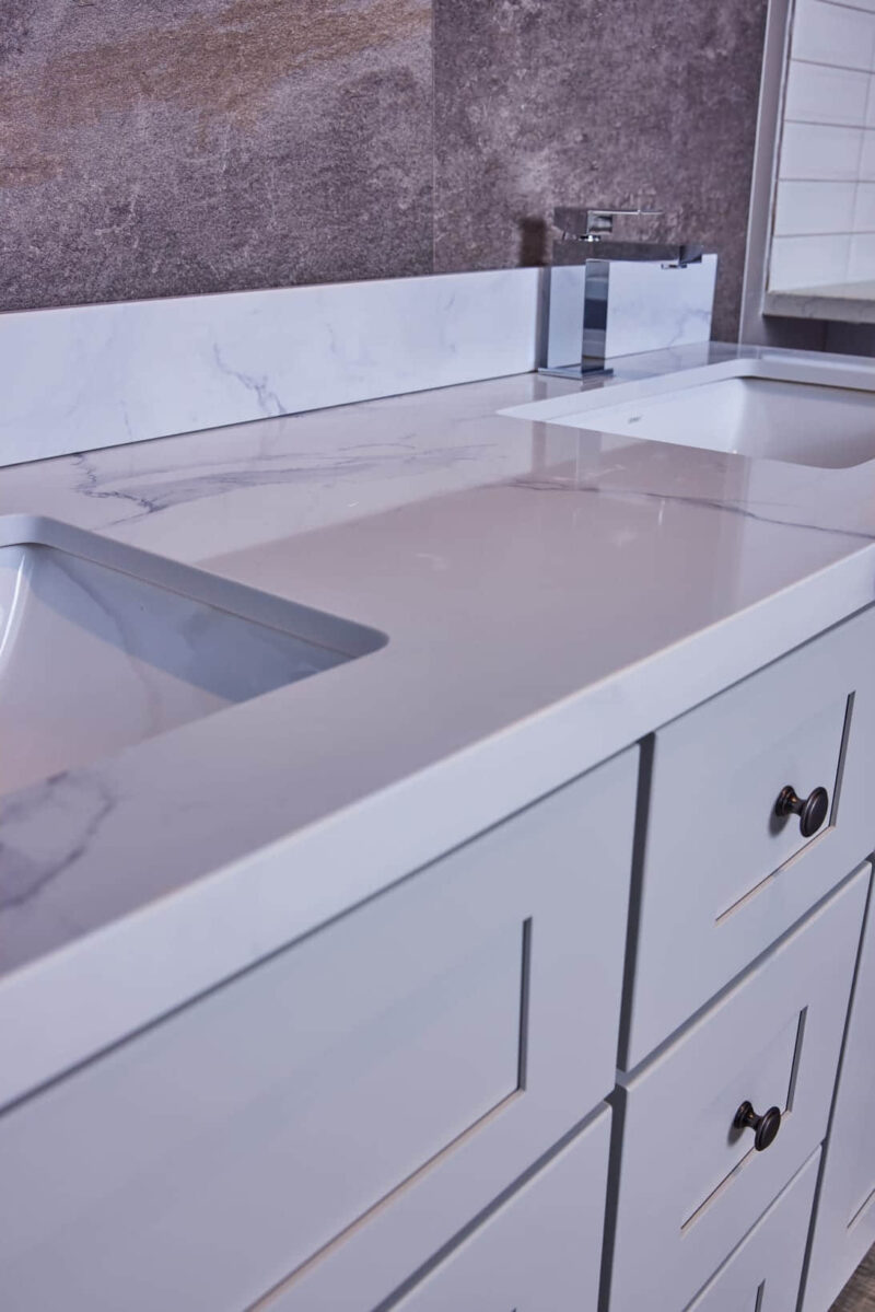 Modern kitchen countertop with marble finish and integrated sink.