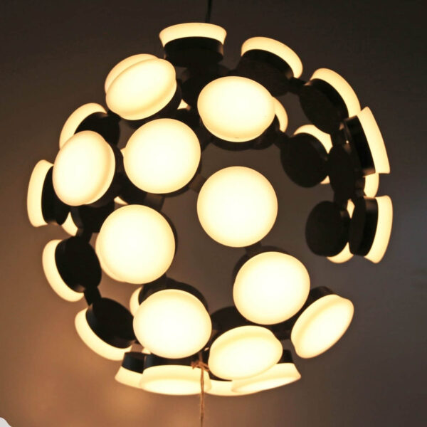 Modern spherical ceiling light with glowing circular bulbs.