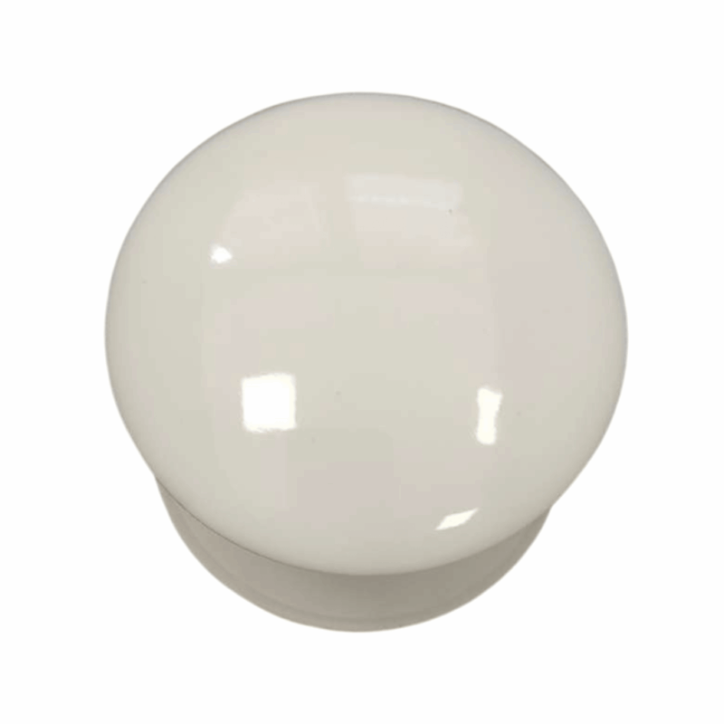 White ceramic cabinet knob against a plain background.