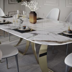 Elegant dining table with marble top and gold legs, set for a meal.