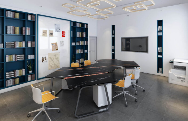 Modern office with black marble desks and bookshelves.