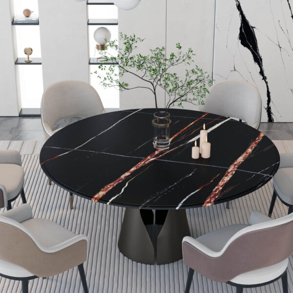 Modern dining room with a round black marble table and six chairs.