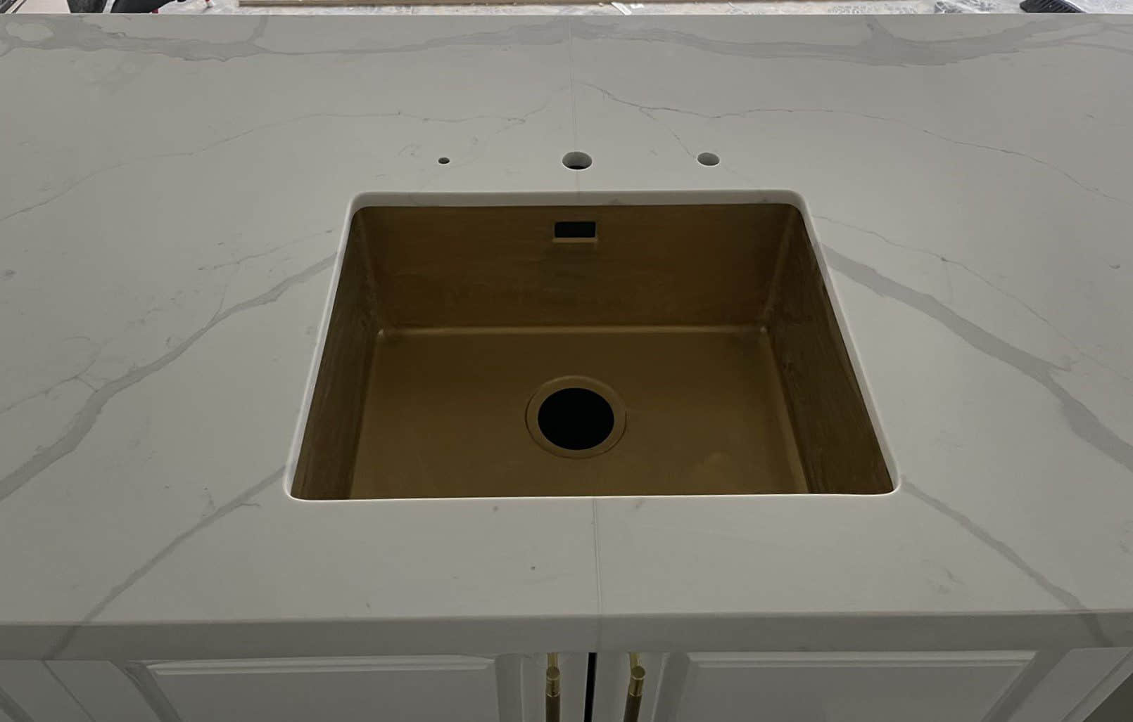 Calacatta Sky Quartz countertop with a built-in sink.