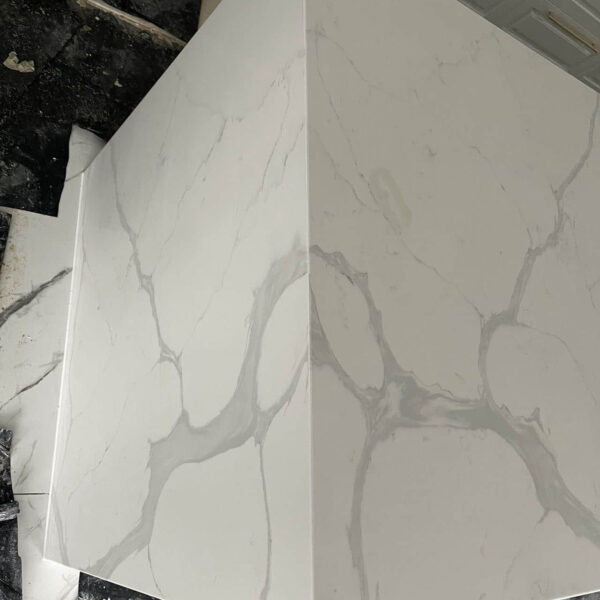 Calacatta Sky Quartz countertop with gray veining.