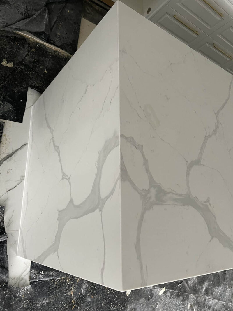 Calacatta Sky Quartz countertop with gray veining.