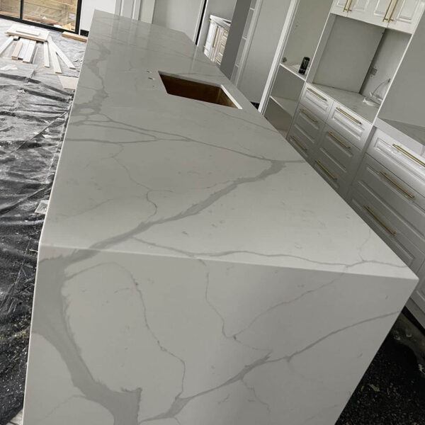 Calacatta Sky Quartz kitchen countertop installation in progress.