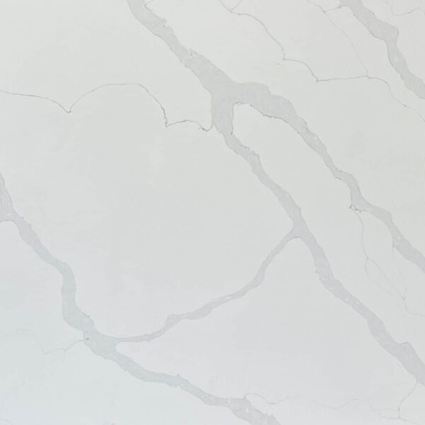 White marble countertop with subtle gray veining.