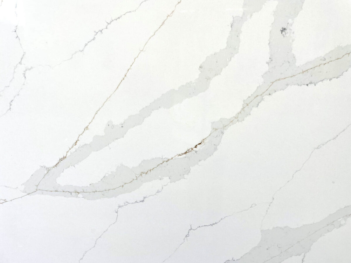 White marble countertop with subtle gray veining.
