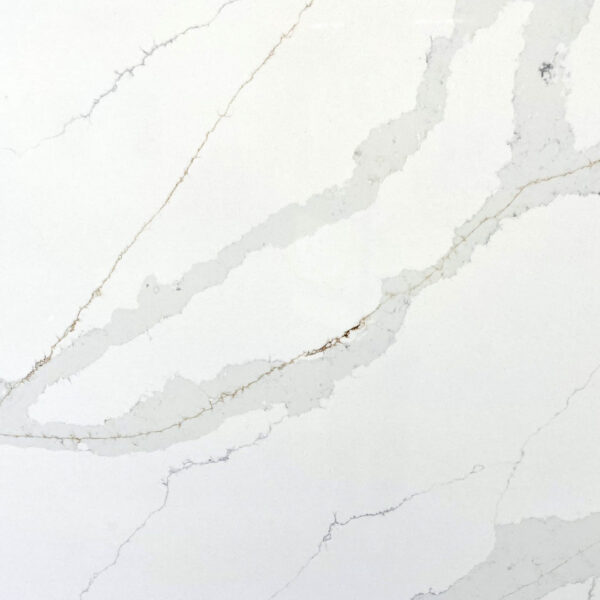 White marble countertop with subtle gray veining.