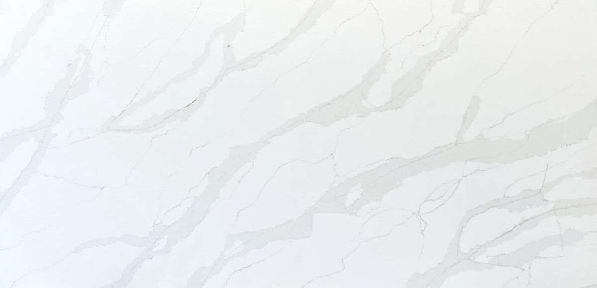 White marble countertop with subtle gray veining pattern.