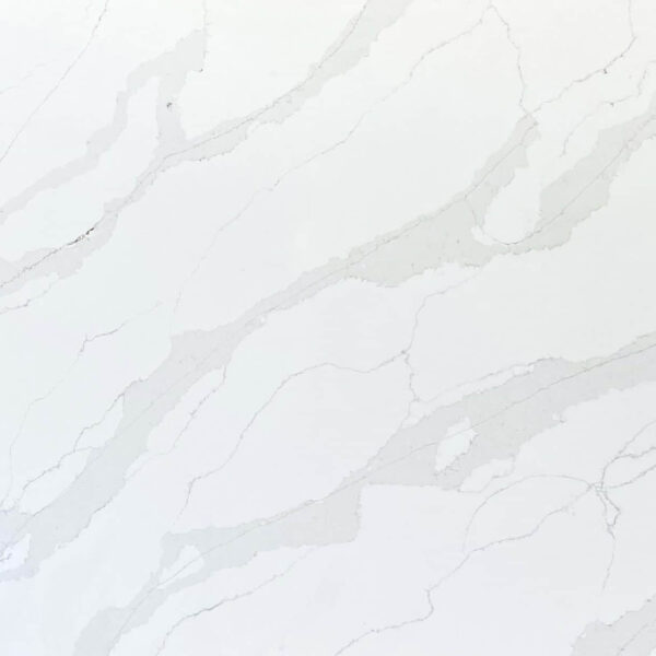 White marble countertop with subtle gray veining pattern.
