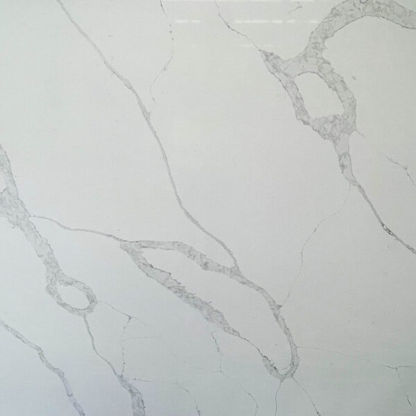 White marble countertop with subtle gray veining pattern.