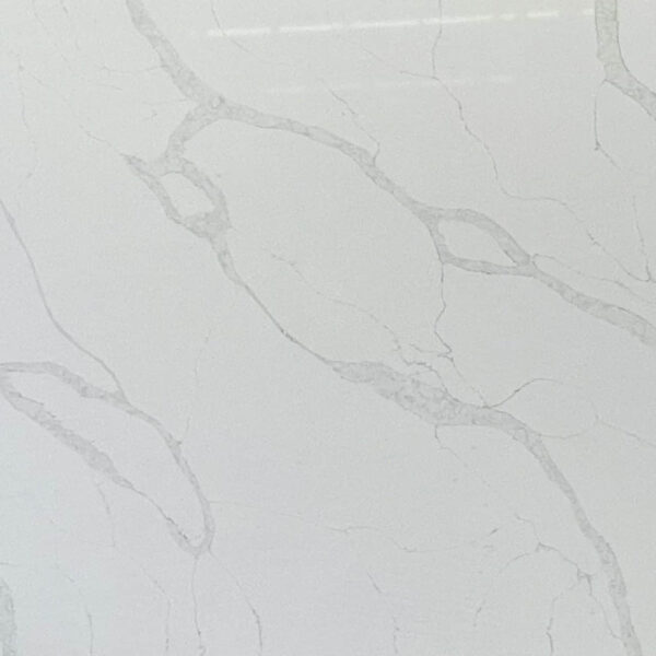 White marble countertop with subtle gray veining.