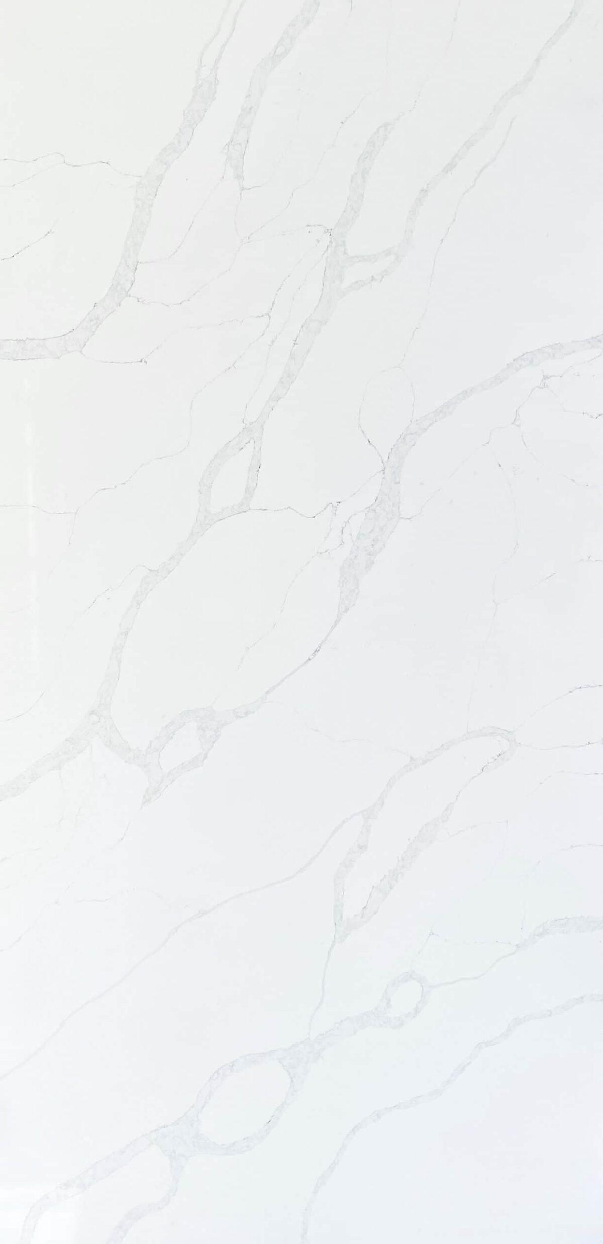 White marble countertop with subtle gray veining pattern.