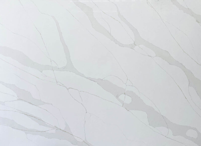 White marble countertop with subtle gray veining.