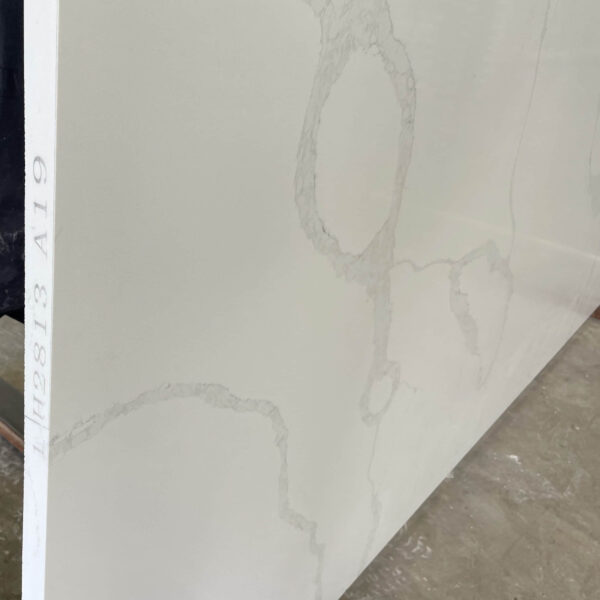 White marble slab with subtle gray veining, labeled H2813 A19.