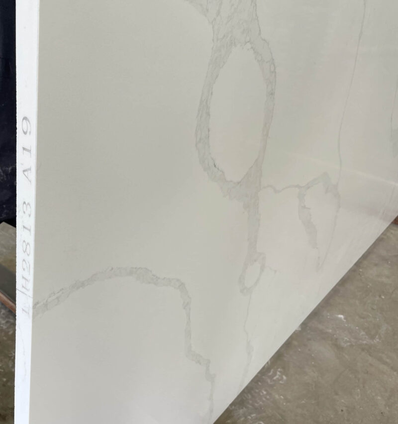 White marble slab with subtle gray veining, labeled H2813 A19.