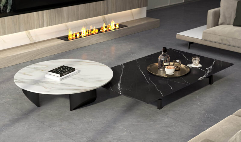 Modern living room with marble coffee tables and fireplace.