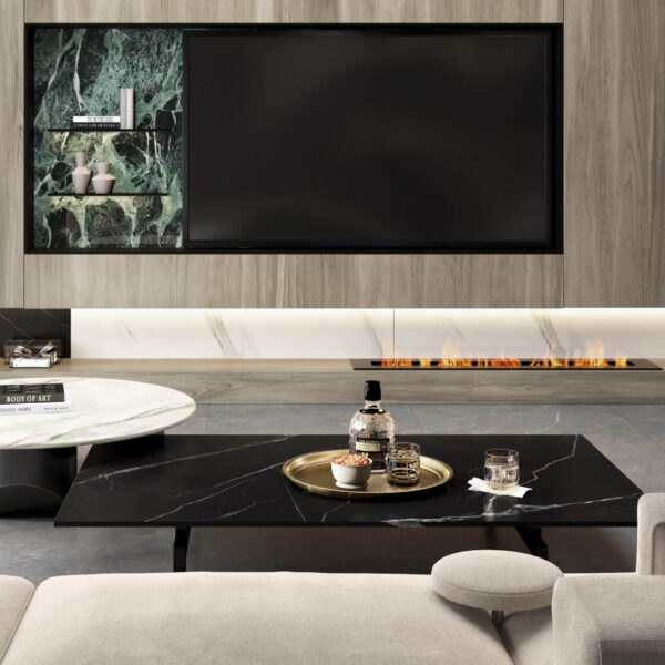 Modern living room with marble coffee table and wall-mounted TV.