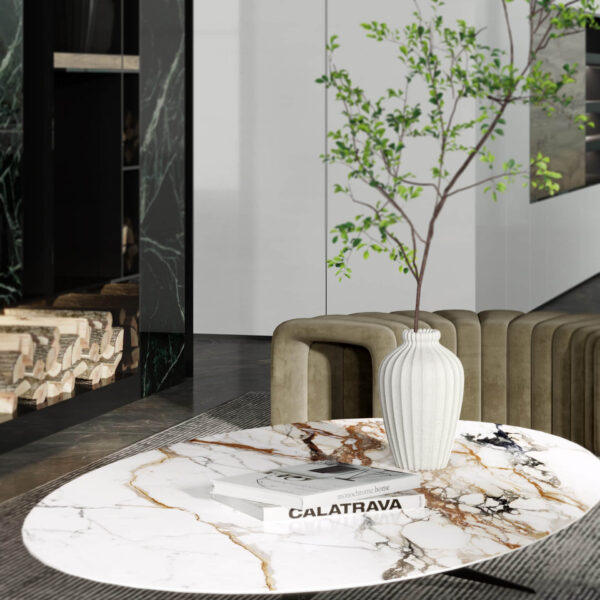 Modern living room with marble table, vase, and greenery.