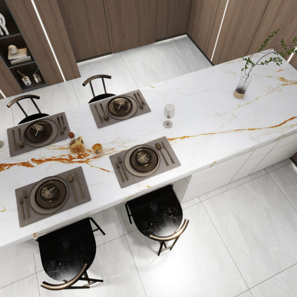 Modern kitchen with marble island, set dining table, and wooden cabinets.