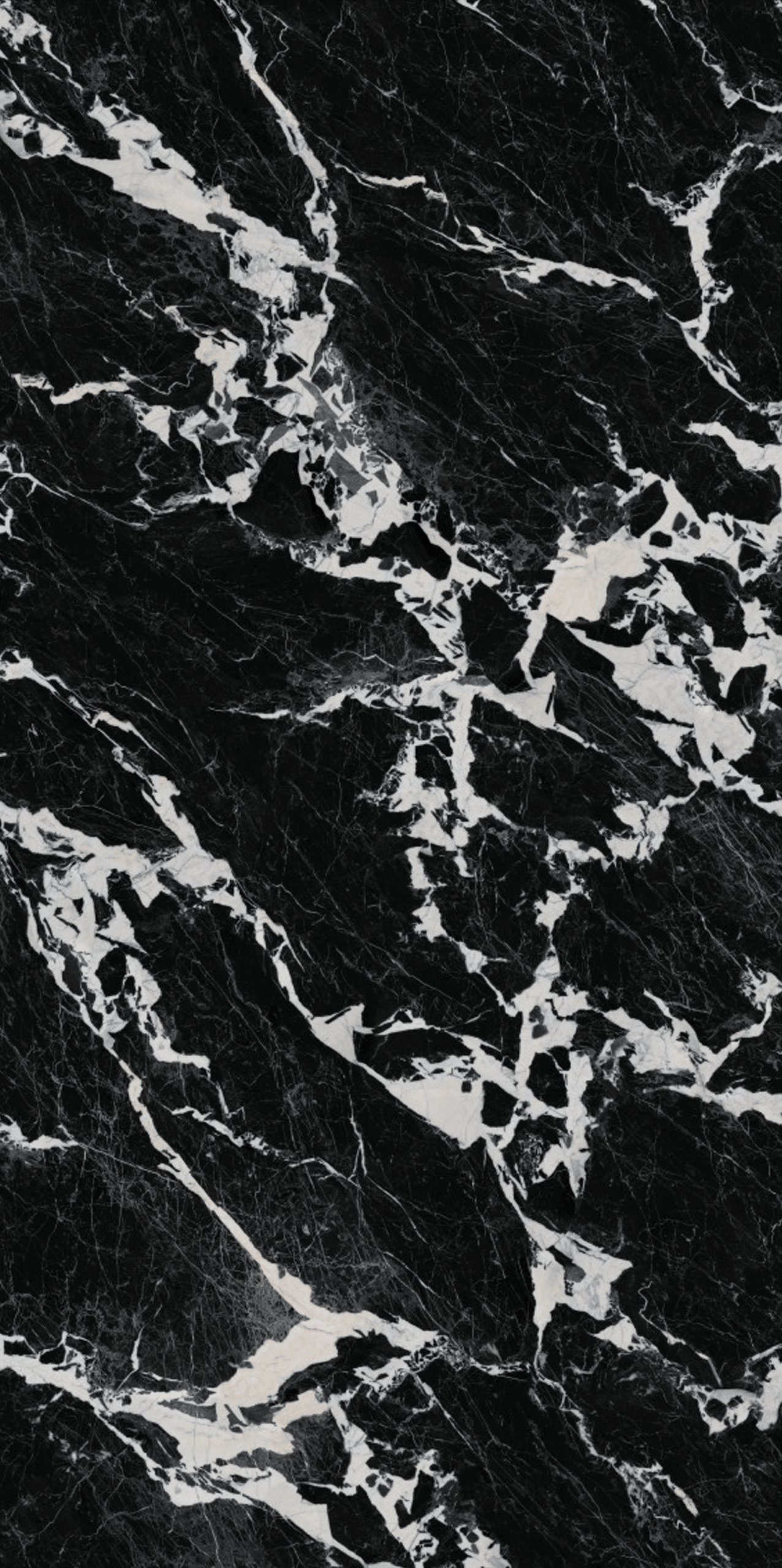 Black marble texture with white veining pattern.