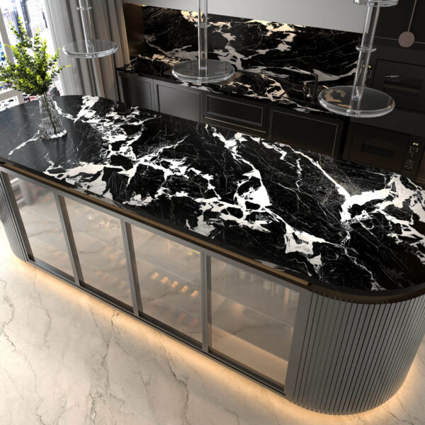 Black marble kitchen countertop with white veining, modern design.