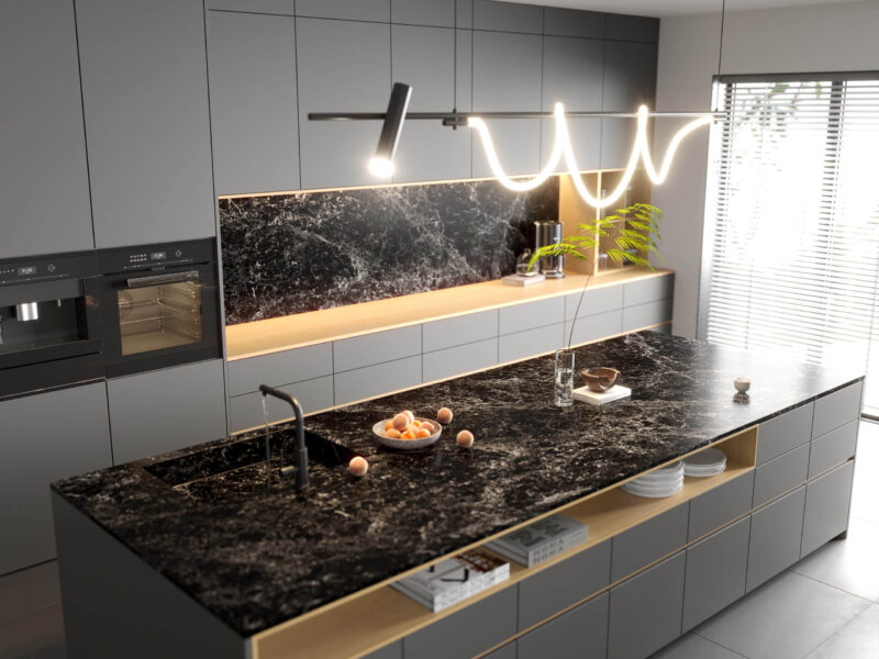 Modern kitchen with black marble island and sleek gray cabinets.