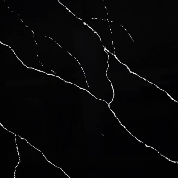 Black marble countertop with white veining pattern.