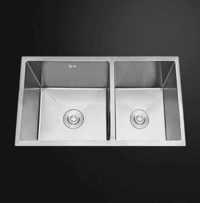 Stainless steel double kitchen sink on a dark background.