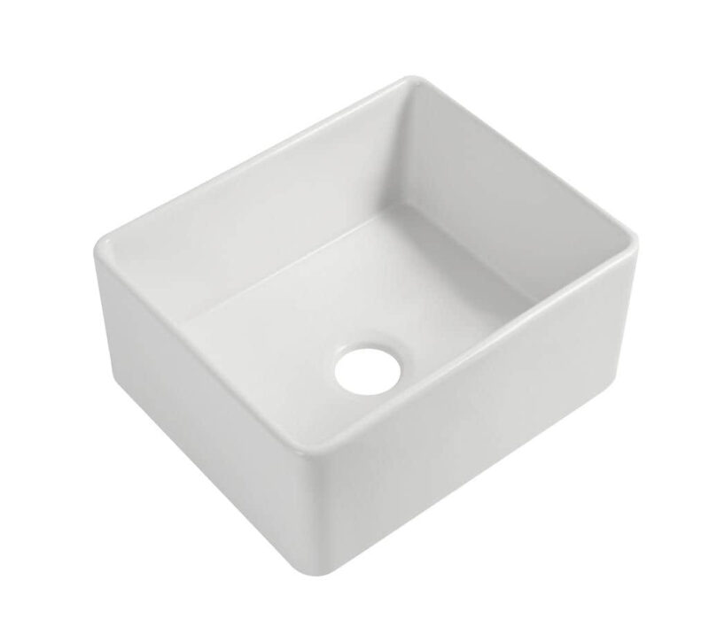 White ceramic kitchen sink with a central drain hole.