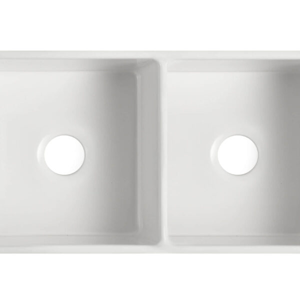 Double bowl white ceramic kitchen sink, top view.