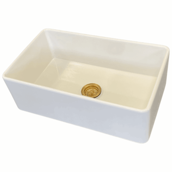 White medium butler sink with gold drain plug.