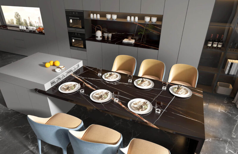 Modern kitchen with black stone island and dining table set for six.