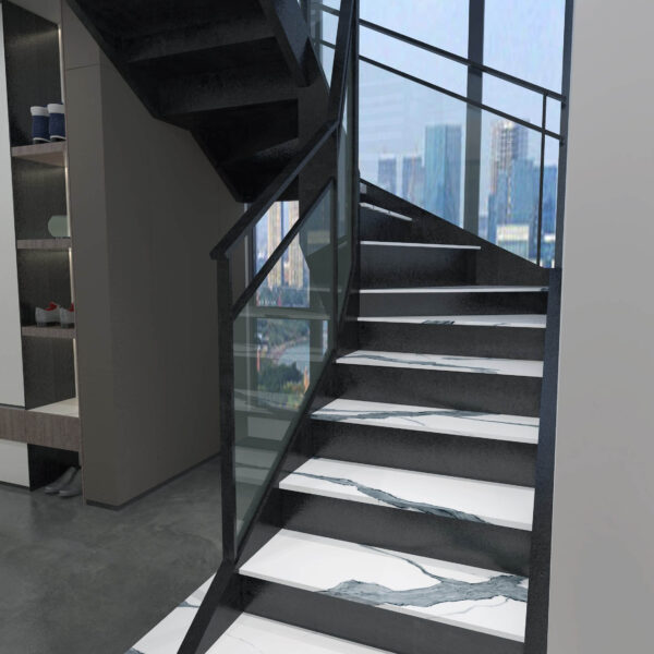Modern staircase with glass railing and marble steps in a contemporary interior.