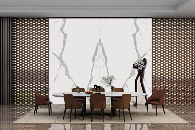 Dining room with marble wall panels and modern decor.