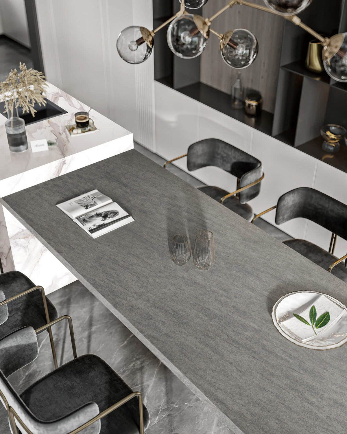 Modern kitchen with marble countertop and black chairs.