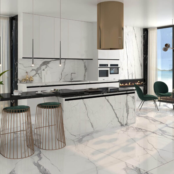 Modern kitchen with marble countertops, island, and green chairs.