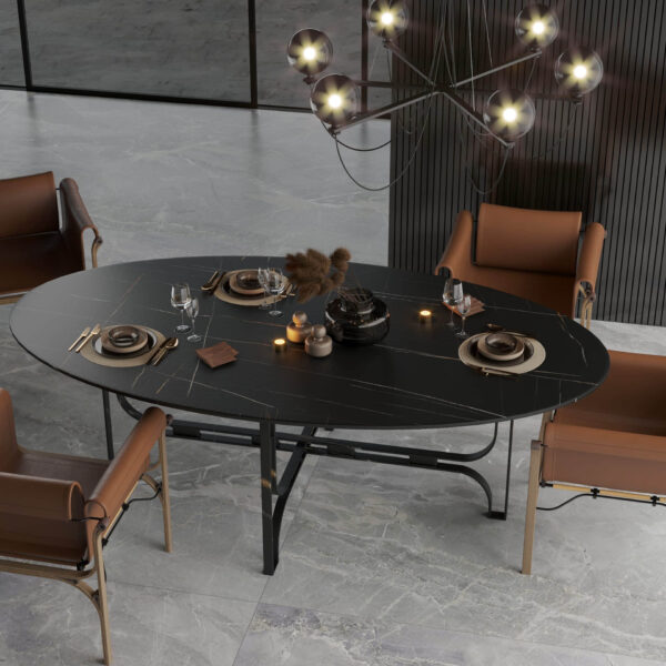 Modern dining table with dark surface, set for dinner, in elegant room.
