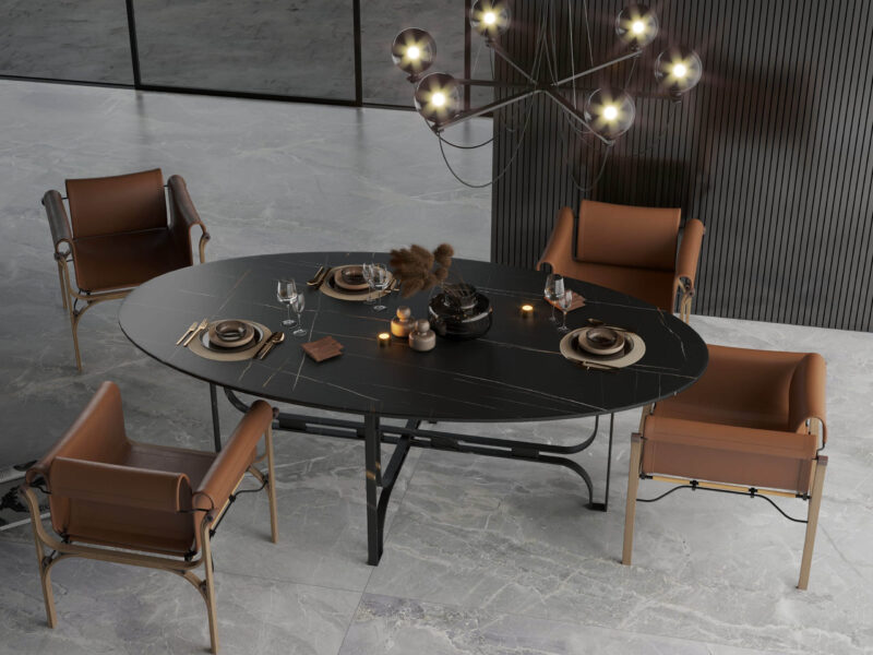 Modern dining table with dark surface, set for dinner, in elegant room.