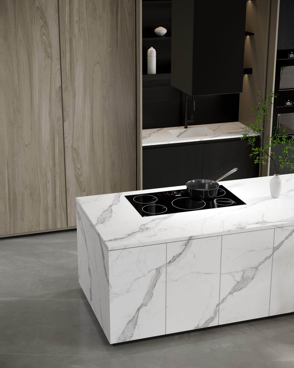 Modern kitchen island with marble countertop and built-in stovetop.