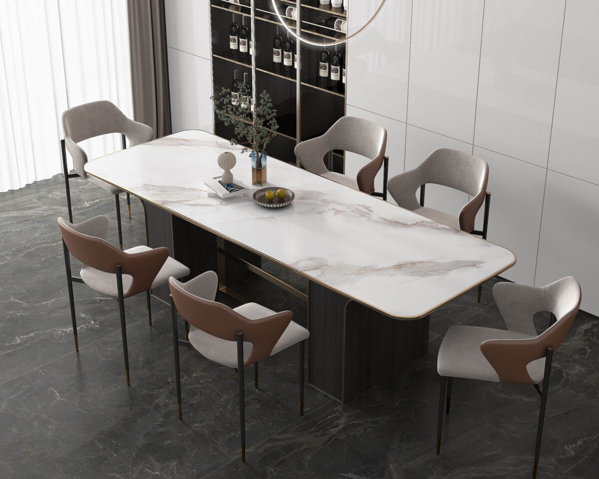 Modern dining room with marble table and six chairs.